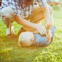 Father and son playing outside