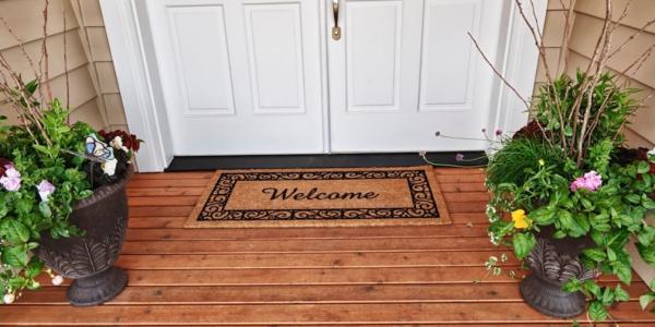 Welcome mat in front of door